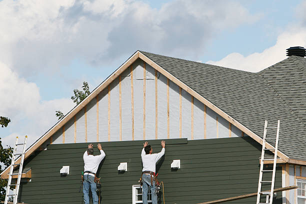 Professional Siding Installation technician working in Fairview, NY